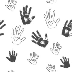 Obraz premium Black and white hands with heart. Seamless pattern. Fingers and palm of child and adult. Vector. Template for fabric, wallpaper, wrapping paper, surface design.