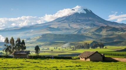 Obraz premium A mountain range with a small village in the foreground