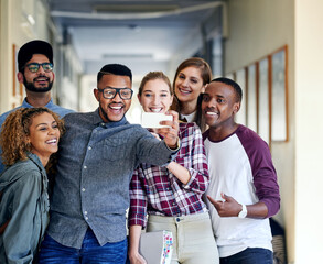 People, group and students with selfie at college for memory, diversity or post on social media. Men, women and happy for photography with profile picture together in hallway, learning and education