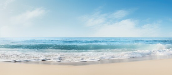 Obraz premium Wave Sand beach background holiday or relax in summer concept. Creative banner. Copyspace image