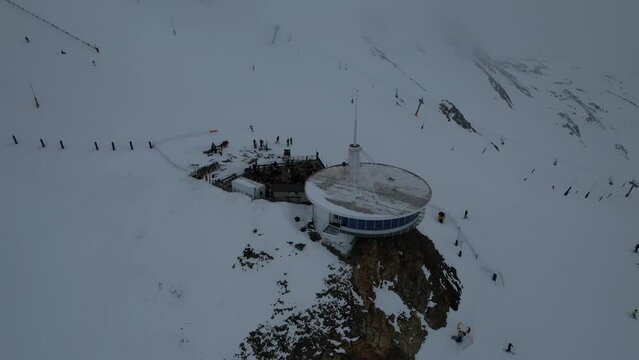 Aerial video over Coll blanc KSB ski resort, Andorra in a snowy winter