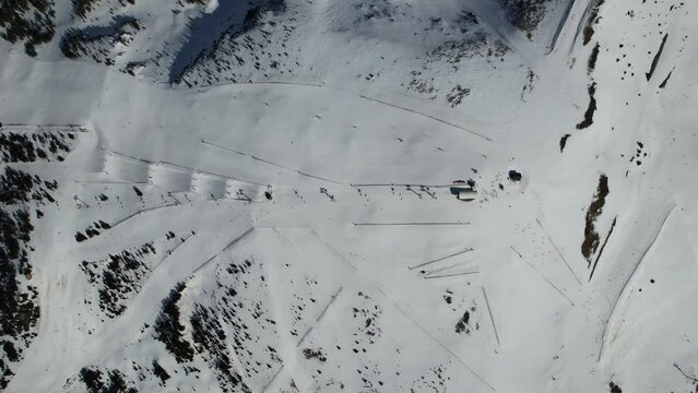 Aerial video over Coll blanc KSB ski resort, Andorra in a snowy winter