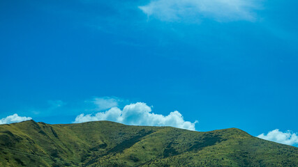 Aba, Sichuan Province - mountains and grasslands under the blue sky