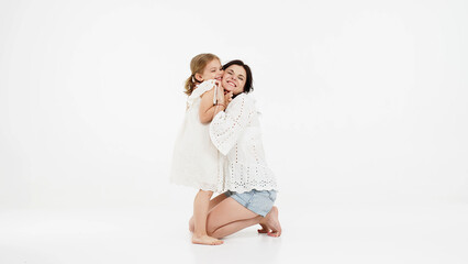 A photo of tender touches and a sensitive moment between mother and daughter.