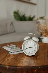 alarm clock on desktop, laptop and notebook for work