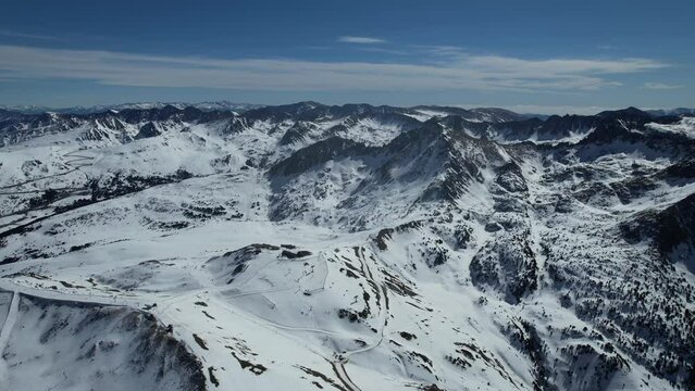 Aerial video over Coll blanc KSB ski resort, Andorra in a snowy winter