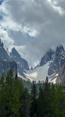 italian alps dolomites national park lake mountain trekking peaks tre cime brais lake carezza lake reflection clouds