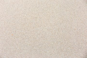 Sand background is smooth, fine, white and clean.