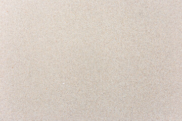 Sand background is smooth, fine, white and clean.