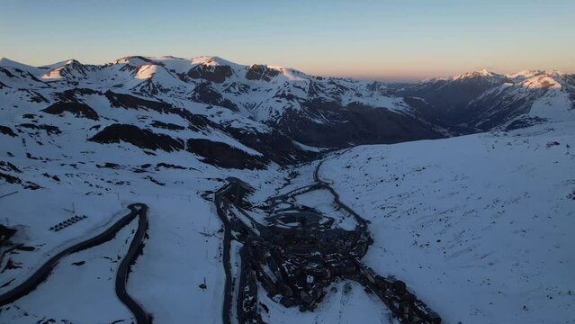 Aerial video over Coll blanc KSB ski resort, Andorra in a snowy winter