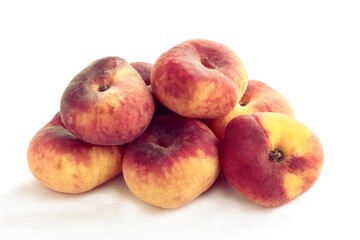 golden and red delicious peaches fruits close up