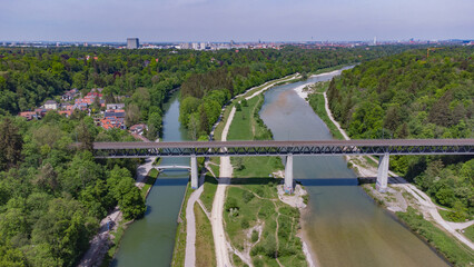 Aerial top view of railway bridge in South Germany over a river near Munich