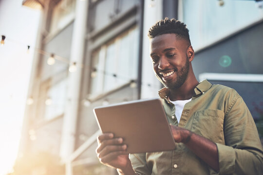 Outdoor, tablet and black man with email, smile and communication with college, notification and online. Education, campus and acceptance to university, happiness and African person in Atlanta