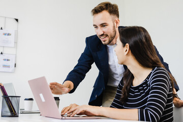 Diverse business team having a meeting in a creative workplace