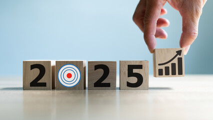 2025 on wooden blocks. Business and investment goal ideas.