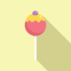 Round candy on stick with yellow icing and berry isolated on background with long shadow