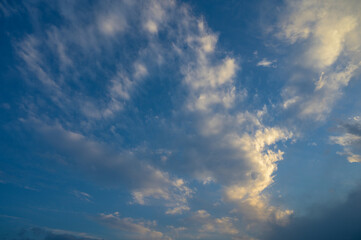 The gathering clouds during sunset create abstract painting patterns in the western sky. 2