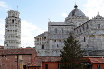 The Cathedral and the Leaning Tower seen from the ancient city walls of Pisa, Italy.