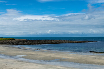 Scotland sea shore on a sunny day on a trip from Kirkwall