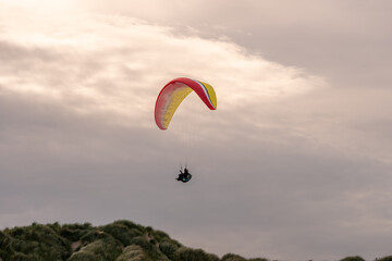 Paragliding on the beach in Dublin, Ireland