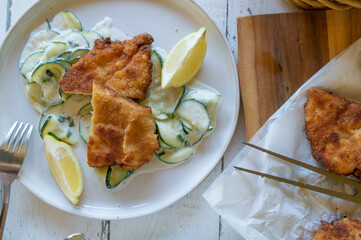 Chicken Schnitzel with zucchini salad on a plate