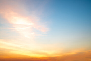 Beautiful , luxury soft gradient orange gold clouds and sunlight on the blue sky perfect for the background, take in everning,Twilight, Large size, high definition landscape photo