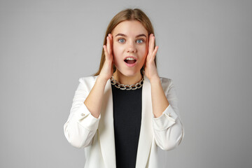 Excited Young Woman in Stylish Outfit Surprised Expression