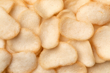 Fresh baked Indonesian shrimp krupuk close up full frame as background