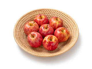 Basket with Royal Gala apple isolated on white background close up