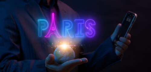 Paris city name icon and symbol design concept. Businessman showing globe with Paris neon line text. For presenting this city to everyone in the world and Supporting tourism businesses.