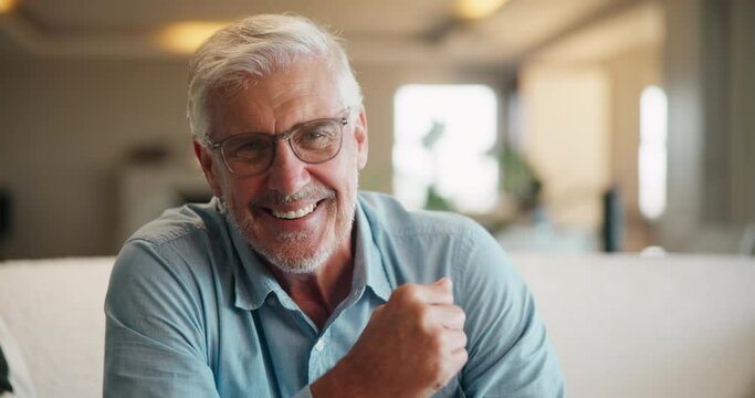 Happy, sofa and face of old man laugh for relaxing, chill and enjoy weekend in living room. Home, retirement and portrait of elderly person smile on couch with confidence, joy and cheerful in house