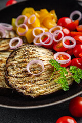 grilled vegetables eggplant, pepper, tomato fresh cooking appetizer meal food snack on the table copy space food background rustic top view