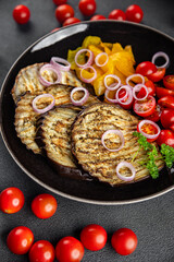 grilled vegetables eggplant, pepper, tomato fresh cooking appetizer meal food snack on the table copy space food background rustic top view