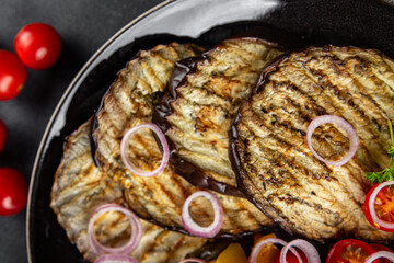grilled vegetables eggplant, pepper, tomato fresh cooking appetizer meal food snack on the table copy space food background rustic top view