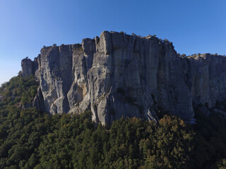 Aerial view of Bismantova Rock at sunset, Pietra di Bismantova, located near to Castelnovo Monti, Reggio Emilia, Italy
