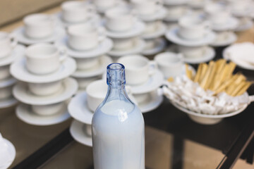 Set of coffee break lunch in the hotel restaurant during conference meeting, with tea and coffee catering, decorated banquet table with white tableware and metal tea maker machine boiler