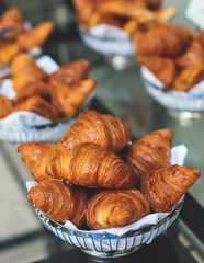 Set of coffee break in the hotel during conference meeting, with tea and coffee catering, decorated catering banquet table with variety of different pastry and bakery, with croissants and cookies
