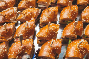 Set of coffee break in the hotel during conference meeting, with tea and coffee catering, decorated catering banquet table with variety of different pastry and bakery, with croissants cookies