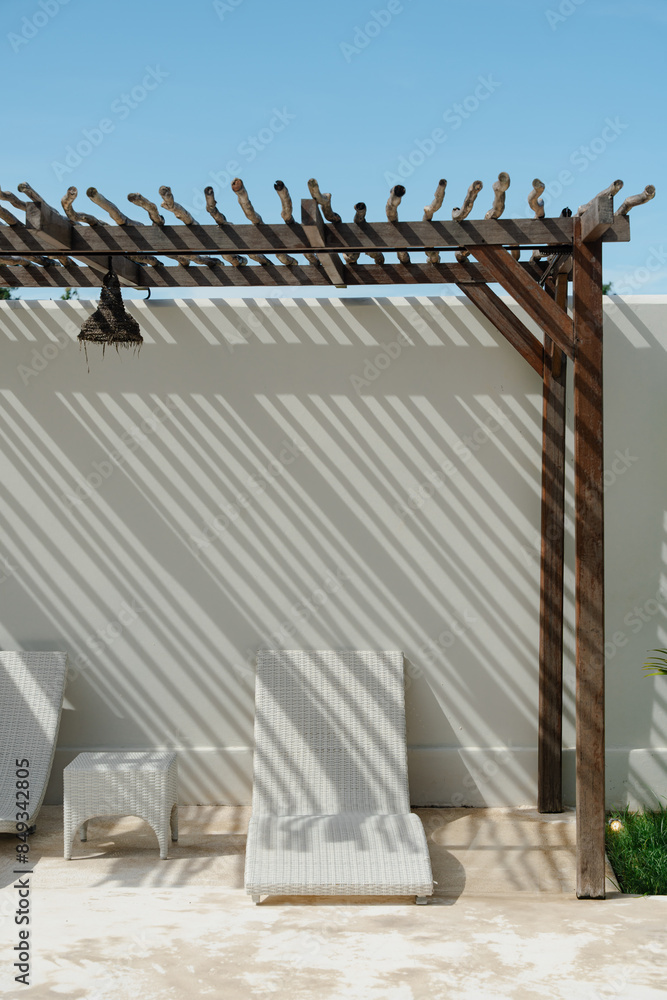 Wall mural outdoor lounge area with wooden pergola