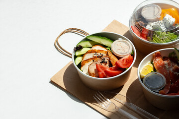 Take out poke bowl with craft bag on white background