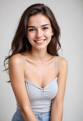 A beautiful 25-year-old girl with a lovely, bright body and a smile on a white background.