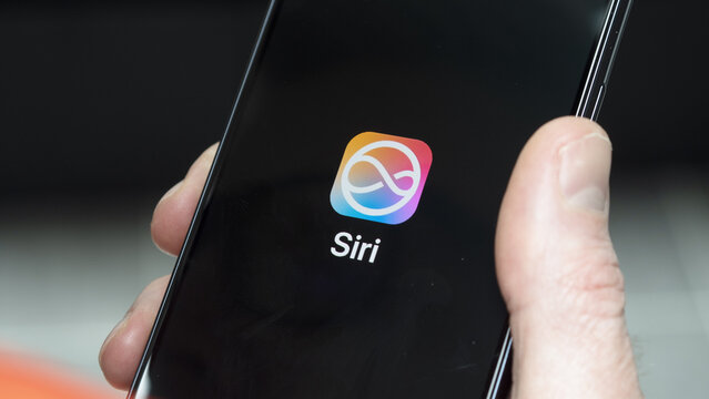 June 13th 2024, logo of Siri AI on a phone screen.