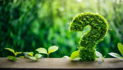 question mark symbol covered in lush green plants against a vibrant green background. The image includes ample space on the right side for captions or text, highlighting nature and inquiry themes