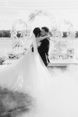 the first dance of the bride and groom inside a restaurant