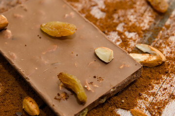 Chocolate Elegance Nut Studded Bars and Scattered Fruits