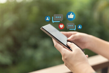 The concept of living on vacation and playing social media. Social media and digital online concept, man using smart phone with Social media. Social Distancing ,Working From Home concept.