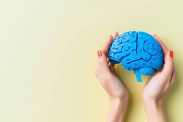 Human hand holding a colorful brain model, depicting the creative potential of AI in cognitive sciences