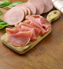 smoked ham of pork on a wooden board