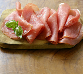 smoked ham of pork on a wooden board