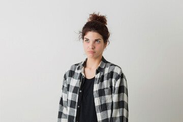 Fototapeta premium portrait of young hipster pretty woman in checkered shirt